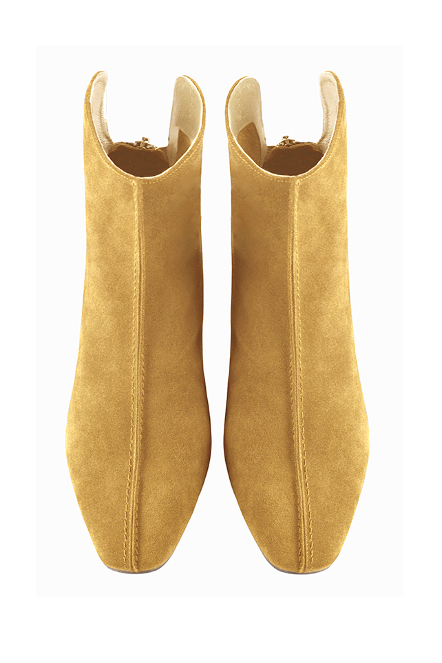 Mustard yellow women's ankle boots with a zip at the back. Square toe. Medium block heels. Top view - Florence KOOIJMAN